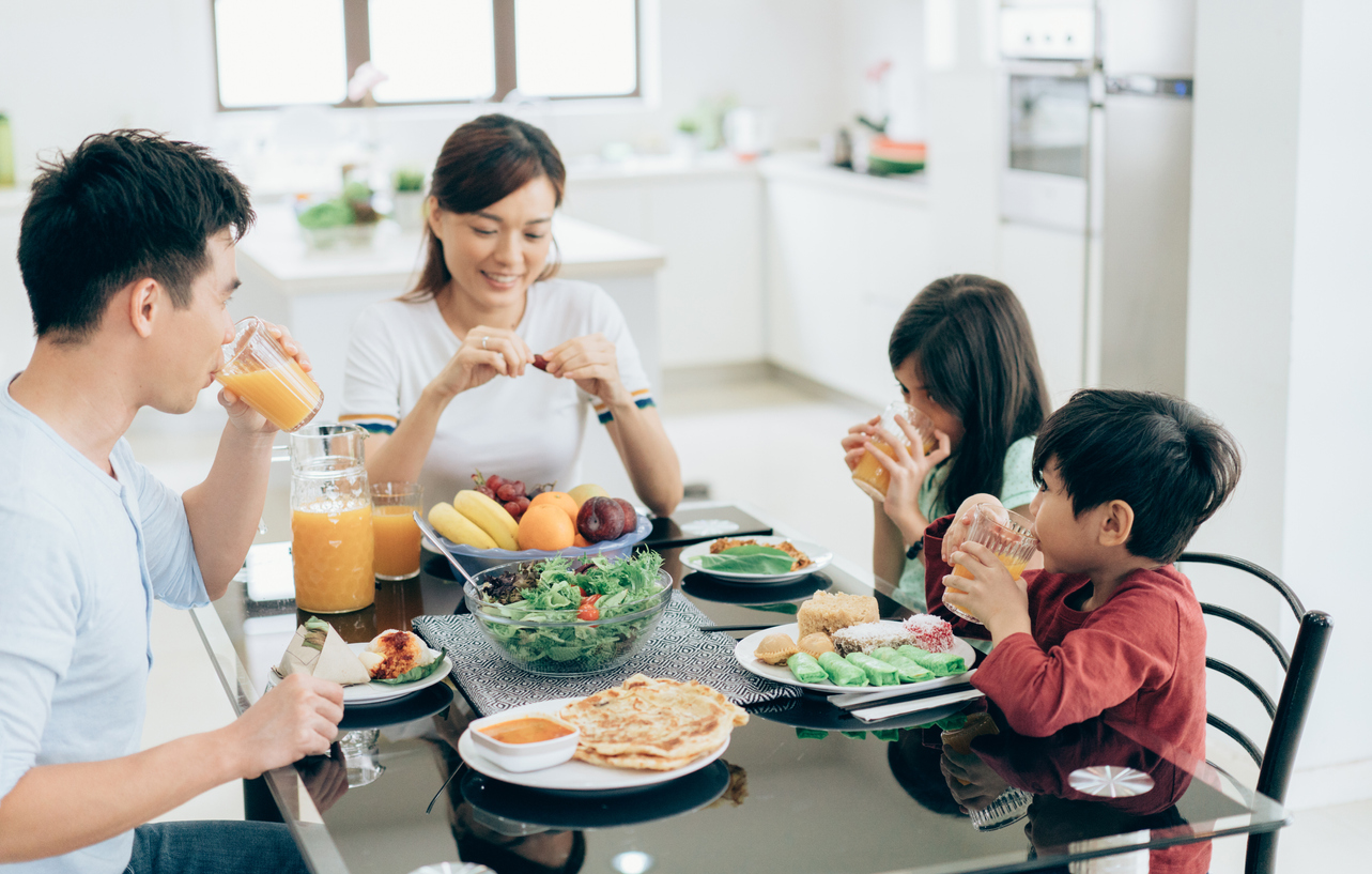 a family eating together around a table